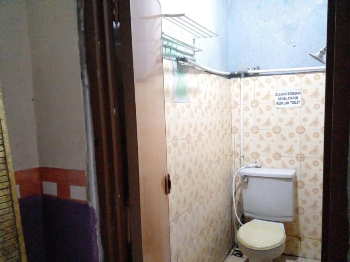 Hotel Alifah 1 Syariah Rawabokor Dua Exterior photo